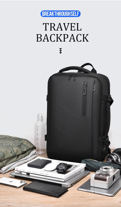 Mochila  – Impermeável, Expansível, com Porta USB e Compartimento para Notebook 15.6”