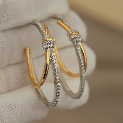 Brincos com Zirconia Oval