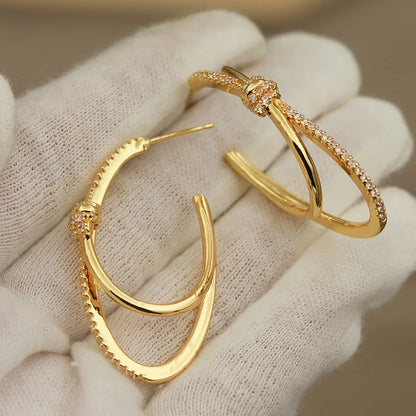 Brincos com Zirconia Oval