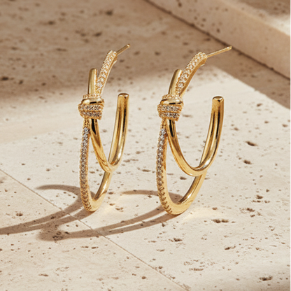 Brincos com Zirconia Oval