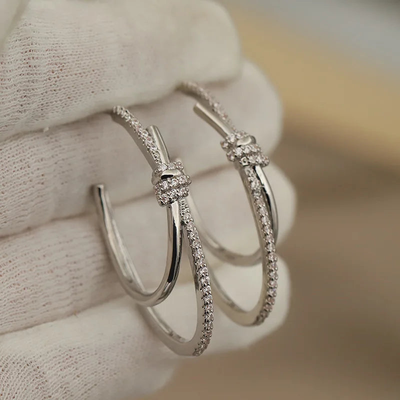 Brincos com Zirconia Oval